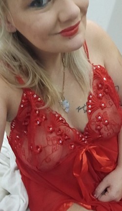 Discover the Experience**   An inviting portrait showcasing warm, confident eyes and a genuine smile, framed by soft lighting that hints at the exclusive and memorable moments offered.